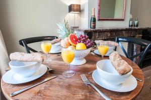 Opțiuni de mic dejun disponibile oaspeților de la Plantage Hortus Apartments