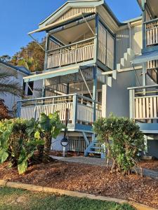 a large building with balconies on the side of it at Villa 20 in Tangalooma