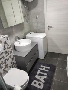 Ein Badezimmer in der Unterkunft Apartman Ivana