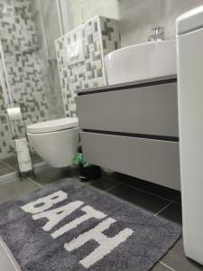 Ein Badezimmer in der Unterkunft Apartman Ivana