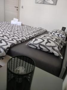 Ein Bett oder Betten in einem Zimmer der Unterkunft Apartman Ivana