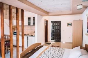 A bed or beds in a room at Bivalvia Apartments
