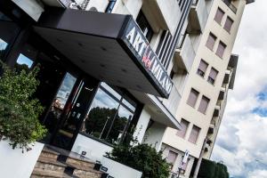 a restaurant with a sign on the front of a building at Art Hotel Milano in Prato