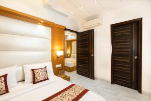 Postel nebo postele na pokoji v ubytování Hotel Star By Star Group- Near Delhi Airport