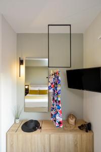 Postel nebo postele na pokoji v ubytování Dandelion apartments