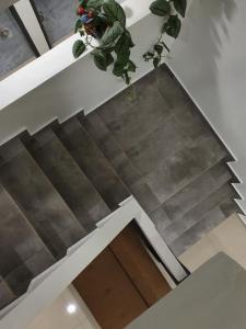 an overhead view of a staircase in a house at Number A Homestay in Raub