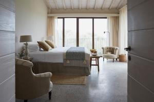 Posteľ alebo postele v izbe v ubytovaní Borgo 69 Villas & Suites