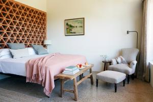 Posteľ alebo postele v izbe v ubytovaní Borgo 69 Villas & Suites