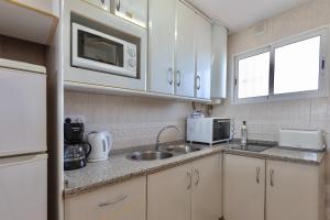 Kuchyň nebo kuchyňský kout v ubytování Apartamento Fuengirola