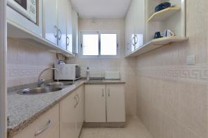 Kuchyň nebo kuchyňský kout v ubytování Apartamento Fuengirola