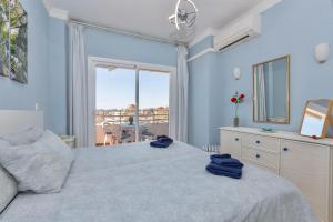 Postel nebo postele na pokoji v ubytování Apartamento Fuengirola + 17 fotografií