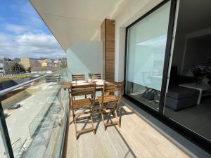 Balkon lub taras w obiekcie Viviendas Vacacionales ENTREPLAYAS Foz