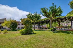 Vonkajšia záhrada v ubytovaní Apartament a Sant Antoni de Calonge