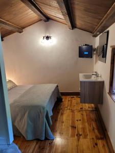 Postel nebo postele na pokoji v ubytování le moulin