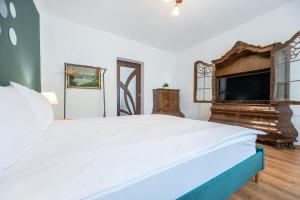Ένα ή περισσότερα κρεβάτια σε δωμάτιο στο Salca Home