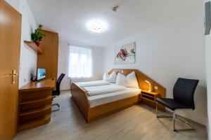 Postel nebo postele na pokoji v ubytování Zeltweg-Rooms