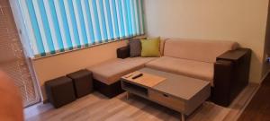 A seating area at Aheloy Apartments
