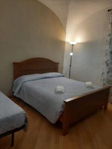 Postel nebo postele na pokoji v ubytování Alloggi Piazza Umberto Primo + 19 fotografií