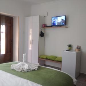 Postel nebo postele na pokoji v ubytování Kaptárkő Apartmanház