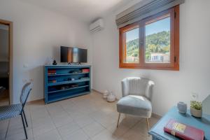 Televízia a/alebo spoločenská miestnosť v ubytovaní Meros Filikon - Zakynthian Residencies