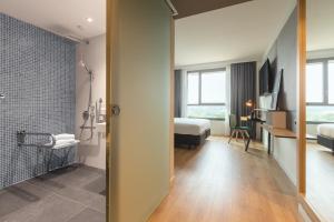 Posteľ alebo postele v izbe v ubytovaní Holiday Inn Barcelona - Sant Cugat by IHG