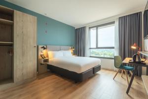 Posteľ alebo postele v izbe v ubytovaní Holiday Inn Barcelona - Sant Cugat by IHG