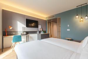 Posteľ alebo postele v izbe v ubytovaní Holiday Inn Barcelona - Sant Cugat by IHG