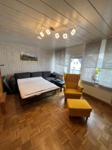 Posezení v ubytování Ferienwohnungen Thingslinde