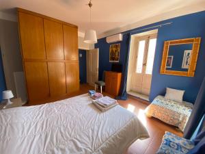 Postel nebo postele na pokoji v ubytování Forte Vigliena Apartment