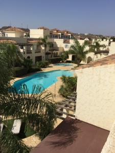 Bazén v ubytování La Casita de la Playa 24-38 nebo v jeho okolí