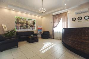 a waiting room with a large flat screen tv at Villa Aino in Petrozavodsk