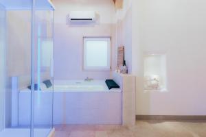 Ein Badezimmer in der Unterkunft Filia Solis - Old Town SUITEs & SPA