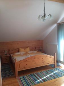 Ένα ή περισσότερα κρεβάτια σε δωμάτιο στο Ferienwohnung Morgensonne