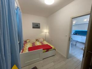 Postel nebo postele na pokoji v ubytování Apartments Grubisin