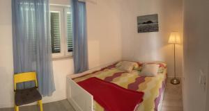 Postel nebo postele na pokoji v ubytování Apartments Grubisin