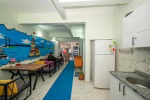 A kitchen or kitchenette at XALİLA HOSTEL & CAFE LADİES ROOM