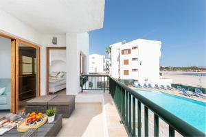 a balcony of a hotel with a swimming pool at Beachside Alcudia in Port d'Alcudia