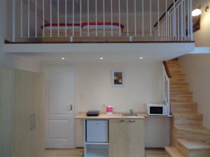 Kuchyň nebo kuchyňský kout v ubytování Loft House Budapest