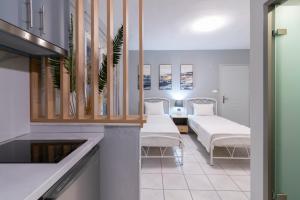 a hospital room with two beds and a sink at Agnandi in Neos Marmaras +64 photos