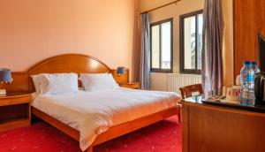 Una cama o camas en una habitación de Rami Hotel 65 fotos más