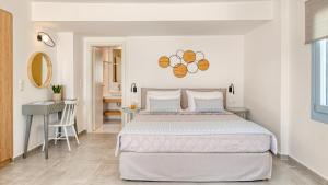 Cama ou camas em um quarto em Lumiére spetses