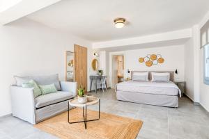 Cama ou camas em um quarto em Lumiére spetses