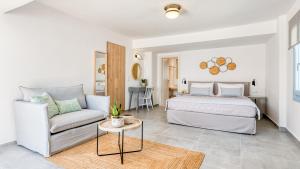 Cama ou camas em um quarto em Lumiére spetses