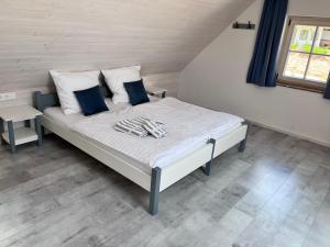 Posteľ alebo postele v izbe v ubytovaní Beck's Borveranda Palkonya