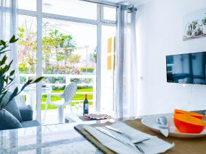 A television and/or entertainment centre at Lorentz Holiday Home
