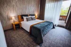 Lova arba lovos apgyvendinimo įstaigoje Gabija Hotel SPA & Conferences