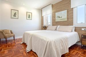 Genteel Home Elcano Terrace客房内的一张或多张床位