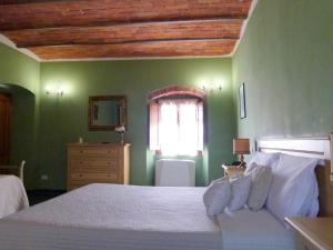 Postel nebo postele na pokoji v ubytování Albergo la Luna