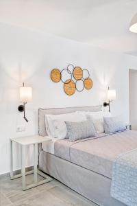 Cama ou camas em um quarto em Lumiére spetses