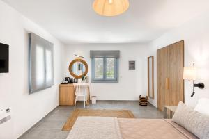 Cama ou camas em um quarto em Lumiére spetses